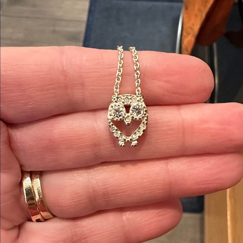 Crystal Eyed Silver Owl Pendant Necklace with silvertone chain.